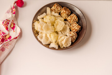 Fried sago pearls chips with almond date rolls!