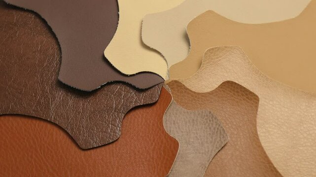 Artificial leather or dermantin for the manufacture of upholstered furniture, shoes or bags. Samples of leatherette. Materials for the textile industry.