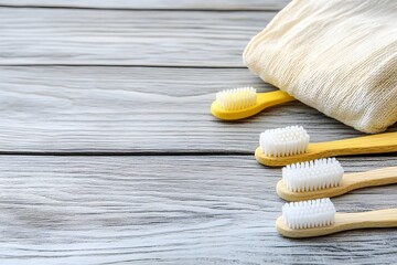 A collection of eco friendly products such as bamboo toothbrushes and reusable bags on a wooden surface with copy space