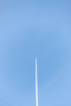 Airplane Contrail Across the Clear Blue Sky