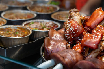 Pigs Snoot and Trotters in street market