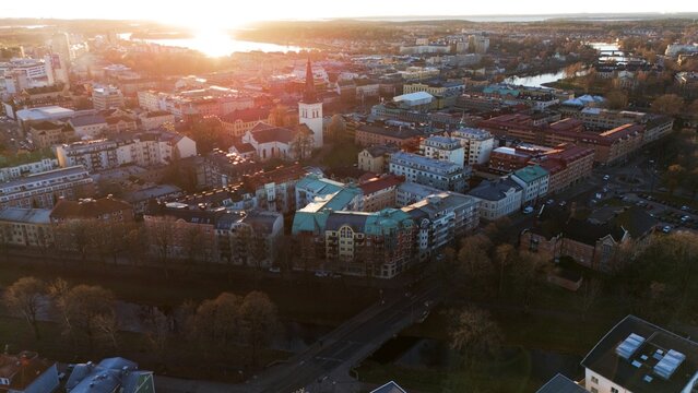 Aerial View of Karlstad, Sweden at Sunset with Historic Church and Cityscape 