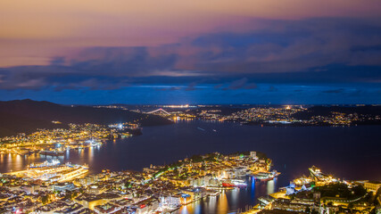 Stunning Twilight Over The Harbor: A Mesmerizing Cityscape Illuminated by Night Lights and Natural Beauty in a Peaceful Twilight Atmosphere