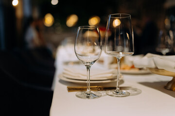 Elegant table setting with wine glasses and fine dining ambiance