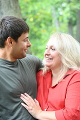 Obraz premium blonde woman with dark-skinned man,