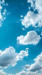 Obraz premium Blue sky filled with fluffy white clouds on display