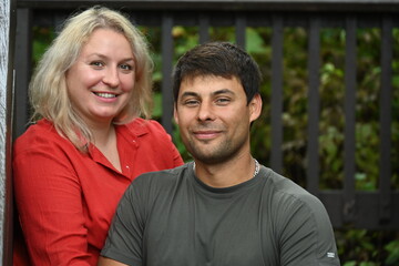 Fototapeta premium blonde woman with dark-skinned man,