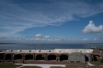 Part of the battery where the cannons were kept on Fort Sumter in Charleston Bay with the city of Charleston in the background across the bay