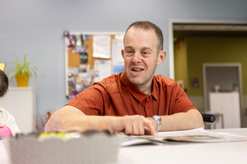 Smiling Man Engaging in Activities at Day Center