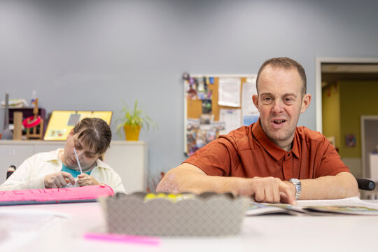 Man and Woman with Disabilities Engaged in Activities