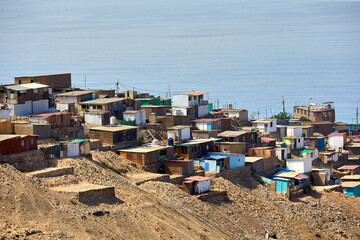 Lima, the capital of Peru, has various neighborhoods and districts, and some of them have informal settlements commonly referred to as "shanty towns" or "slums."