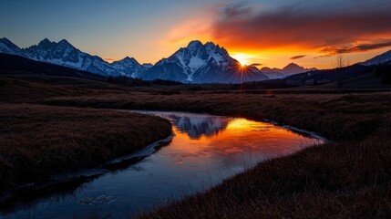 Fototapeta premium Majestic Sunset over Snow Capped Mountains and Serene River