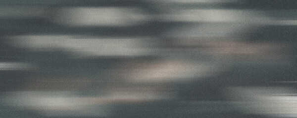 An abstract background featuring a blurred, textured surface with subtle patterns and a sense of movement. This image is ideal for creating a dynamic and atmospheric feel, suitable for graphic design,