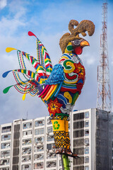 The iconic giant rooster sculpture decorates Recife's Carnival in Brazil with vibrant colors and intricate details.