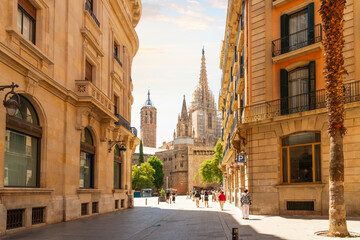 View of the tower and spires of the Gothic Barcelona Cathedral of Santa Eulalia in the Gothic Quarter, El Born district of Barcelona, Spain. 