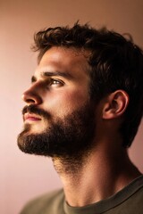 Fototapeta premium Thoughtful man misty beige pink