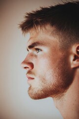 Obraz premium Thoughtful man misty beige pink