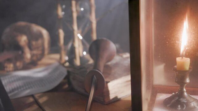 medieval desk scene focus on candle