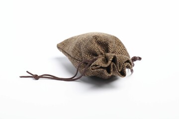 One brown burlap sack on white background