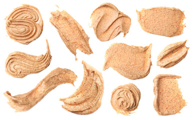 Yummy nut butter. Samples isolated on white, set. Top view