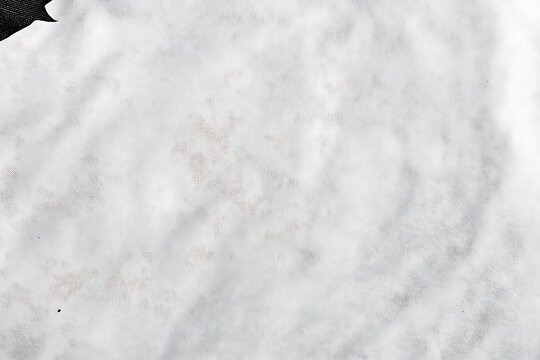 Subtle white fabric texture with delicate shading and textile weave