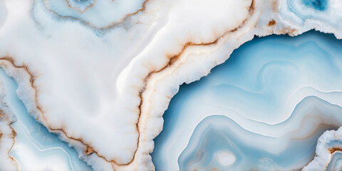 Obraz premium Banded agate stone displays a mesmerizing blend of white and blue hues in intricate patterns.