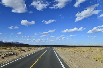 Desert road sand dunes in Xinjiang, China