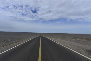 Desert road sand dunes in Xinjiang, China