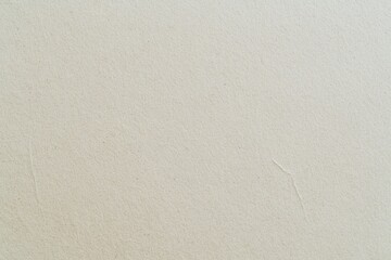 Obraz premium Cream textured paper background.