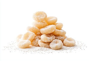 Fototapeta premium Heap of delicious italian gnocchi dumplings covered in flour on white background studio shot close up food