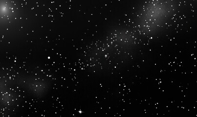 Dark night sky with distant stars and nebulae.