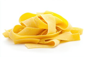 Fresh yellow pasta tagliatelle nests on a white surface showcasing delicate texture and culinary appeal