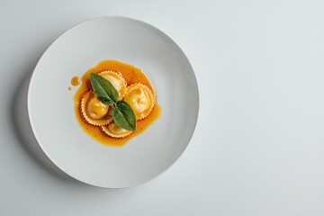 Artistic Culinary Still Life Pasta Dish Ravioli with Sage on White Plate with Warm Lighting
