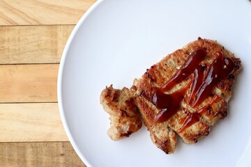 Pork steak grilled barbecue on the plate
