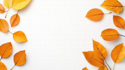Autumn leaves in vibrant yellow and orange hues create beautiful flat lay arrangement, evoking sense of seasonal change and warmth