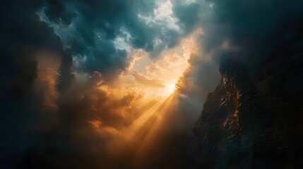 Fototapeta premium A canyon illuminated by sun rays breaking through dense, dramatic clouds