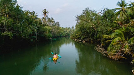 Kayaking through lush mangroves in Chumphon Thailands tranquil waters
