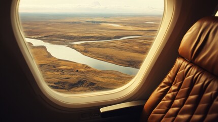 Naklejka premium Scenic Aerial View from Airplane Window Over Gorgeous Landscape