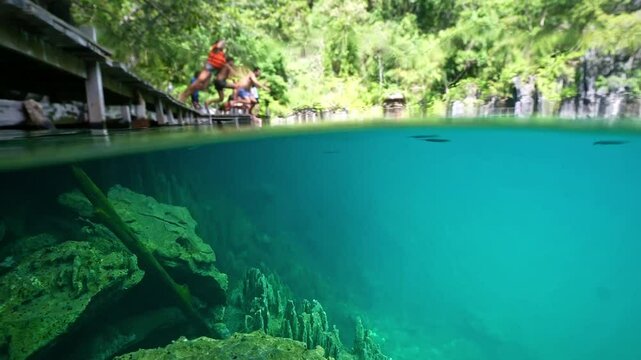 snorkeling Kayangan Lake limestone rocks in Philippines. tourism destination for snorkeling and scuba diving in Coron, Palawan. 