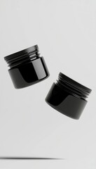 Black glossy two jar cream floating on soft vertical background