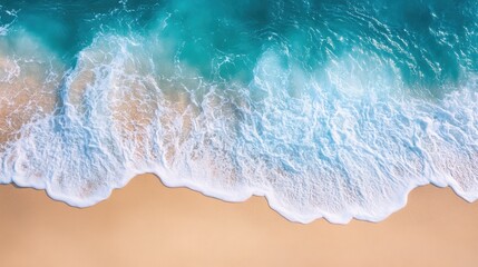 Aerial View of Waves Gently Crashing on Serene Sandy Beach