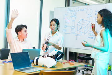 University students are learning and having a group discussion together about their sciences project.