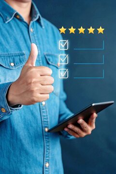 Business people,or By giving the most or the best satisfaction rating.Customer service satisfaction survey concept customers show satisfaction through the application on the laptop screen.business, aw