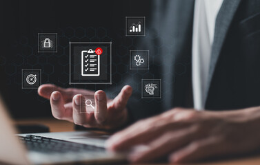 close up with hand of business person identify danger risk with AI among normal incident. Risk management concept for business and personal planning for risk mitigation with information and decision