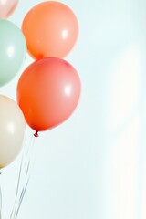 collection of colorful balloons floating gently against blurred background creating serene atmosphere