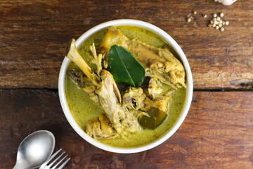 Opor Ayam, Indonesian traditional food, made from chicken cooked with coconut milk and spices. Popular during Eid al Fitr.