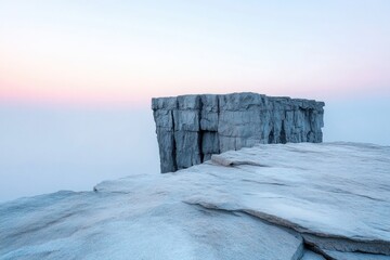 stark rugged cliff face looms against soft overcast sky embodying essence of timelessness and mystery