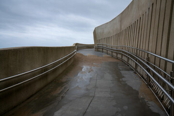 Descent to the city beach on the Marine Boulevard of the resort town on the Baltic Sea coast on a cloudy summer day, Svetlogorsk, Kaliningrad region, Russia