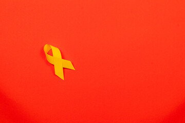Obraz premium Yellow ribbon symbolizes awareness for cancer support and health campaigns