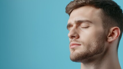 Close-Up Portrait of Man with Eyes Closed Representing Relaxation and Mental Health